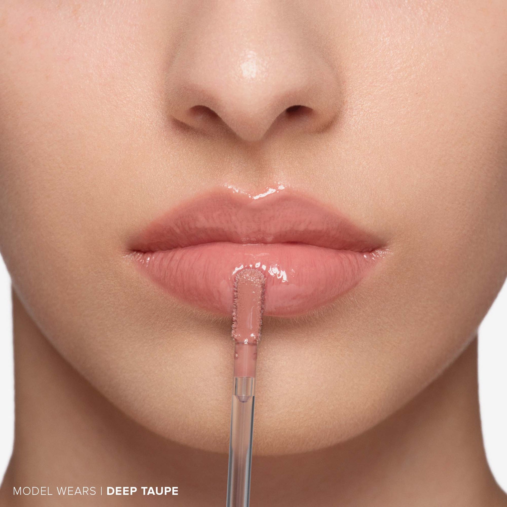 Tinted Lip Gloss Trio - Lip Gloss Wand On Model